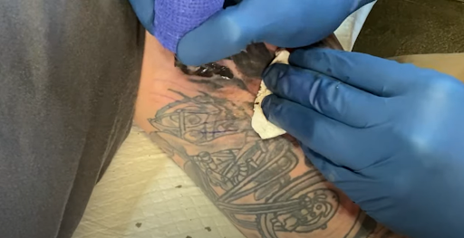 How much do you tip a tattoo artist for a $50 tattoo?