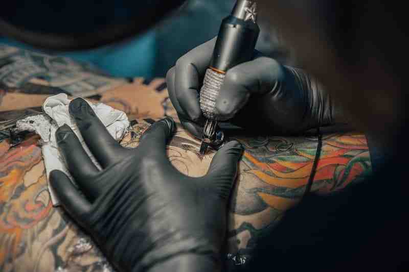 How much do you tip for a $800 tattoo?