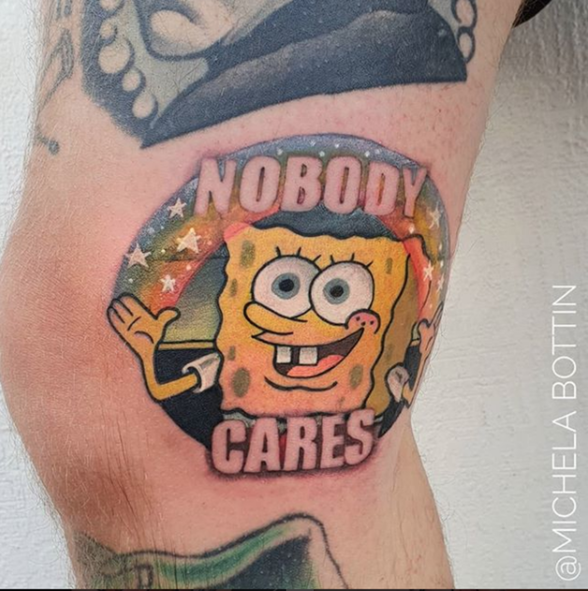 What tattoo does Chris Nunez own?